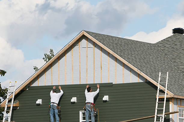 Professional Siding Installation technician working in Bergholz, OH
